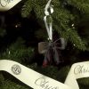 SOUS LE SAPIN Stainless Steel Bow Ornament - 2026 Edition